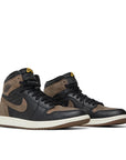 Pair of Jordan 1 Retro High OG in brown and black