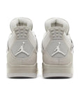 Heels of Jordan 4 Retro Frozen Moments Women's in grey and silver.