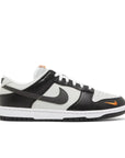 Side of Nike Dunk Low Black Total Orange Mini Swoosh in black, white and orange.