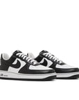 Pair of Nike Air Force 1 QS Terror Squad Blackout in Black and White.