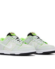 Pair of Nike Dunk low University of Oregon PE in silver, white, black and green