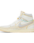 Side of Jordan 1 Retro High OG SP Union LA Bephies Beauty Supply Summer of '96 in white, grey and sail