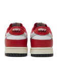 Heels of Dunk Low Chicago Split in red, black and white