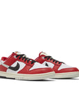 Pair of Dunk Low Chicago Split in red, black and white