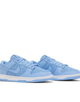 Pair of Nike Dunk Low Topography University Blue in pale blue