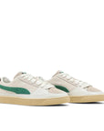 Pair of Puma Suede Rhuigi Villasenor in white, cream and green