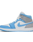 The side of the Jordan 1 Mid University Blue Grey sneaker