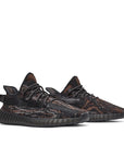 A pair of adidas Yeezy Boost 350 v2 MX Rock sneakers