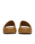 Heels of the adidas Yeezy Slide Ochre sneaker