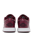 Heels of Jordan 1 low black dark beetroot in black, dark beetroot and white