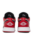 Heels of Jordan 1 Low Bred Toe (GS) in red, white and black.
