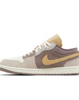 Side of Jordan 1 Low SE Craft Taupe Haze in Brown, Grey and Sail.