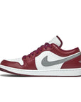 Side of Jordan 1 Low White Bordeaux in white and Bordeaux.