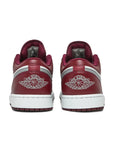 Heels of Jordan 1 Low White Bordeaux in white and Bordeaux.