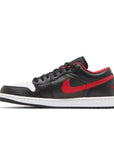 Side of Jordan 1 Low White Toe in black, red and white.