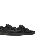 Pair of Jordan 1 Retro Low OG SP x Travis Scott Black Phantom in Black.