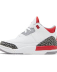 Side of Toddler Nike Jordan Air 3 basketball shoes in a white and fire red colour