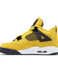 Side of Jordan 4 Retro Lightning (2021) in Yellow and Dark Blue.