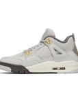 Side of Jordan 4 Retro SE Craft Photon Dust (GS) in shades of grey