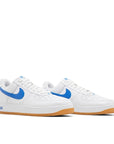 A pair of Nike Air Force 1 07 Colour of the Month Varsity Royal Gum sneakers in white and blue