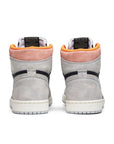 Heels of the Nike Air Jordan 1 basketball shoes in grey hyper crimson colour