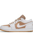 Side of Nike Air Jordan 1 Low Hemp White basketball shoe is in a white and hemp colourway.