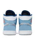 Heels of the Nike Jordan Air 1 mid basketball shoes are in a blue and fiery red colourway.