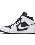 Side of the Jordan 1 Mid 'Split Black White' is in a black and white colourway