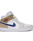 Side of the Air Jordan 1 A Ma Maniere is in a white, light grey and shaggy beige colourway