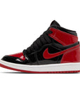 Side of the pre school Nike Air Jordan 1 Retro High OG Patent Bred Off-White University blue childrens shoes in blue and white