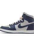 Side of the Air Jordan 1 Retro High '85 'Georgetown' is in a college navy, summit white and tech grey colourway.