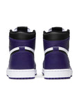 Heels of the Nike Air Jordan 1 Retro High Court Purple White basketball shoes in white and purple