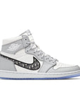 Side of the Nike Air Jordan 1 Retro High Dior sneakers in grey and white