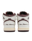 Heels of the Air Jordan 1 A Ma Maniere is in a cream and maroon colourway