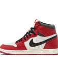 Side of the Air Jordan 1 Retro High OG 'Lost & Found' is in a black, red and white colourway