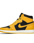 Side of the Nike Air Jordan 1 Retro High Pollen basketball shoes in yellow and black