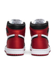 Heels of the women's Nike Air Jordan 1 Retro High Satin-Black basketball shoes in black, red and white