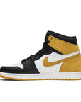 Side of the Nike Air Jordan 1 High Yellow Ochre Michael Jordans in white, black and ochre
