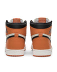 Heels of the Nike Air Jordan 1 Retro Reverse Shattered Backboard basketball sneakers in orange and white