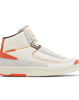 Side of the Air Jordan 2 Maison Chateau Rouge is in a white, light grey and orange colourway