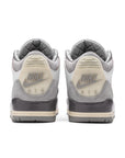Heels of the Nike Jordan Air 3 A Ma Maniere basketball shoes in a white grey and subtle cream colour
