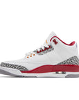 Side of Nike Jordan Air 3 basketball shoes in a white and cardinal red colour with an elephant print