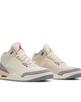 A pair of Nike Jordan Air 3 basketball shoes in a white cream muslin colour