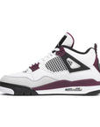 Side of the Nike Air Jordan 4 Retro PSG Paris Saint-Germain basketball sneakers in white, purple and black