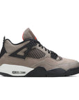 Side of the Nike Air Jordan 4 Retro Taupe Haze basketball sneakers in taupe