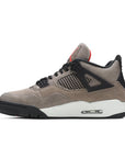 Side of the Nike Air Jordan 4 Retro Taupe Haze basketball sneakers in taupe