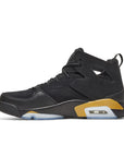 Side of the Nike Jordan Flight Club 91 basketball shoes in black and metallic gold
