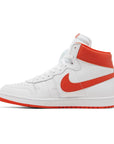 Side of the Nike Air Ship Team Orange basketaball sneakers in white and orange