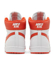 Heels of the Nike Air Ship Team Orange basketaball sneakers in white and orange
