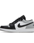 Side of Nike Air Jordan 1 Low Shadow Toe sneakers in grey and black